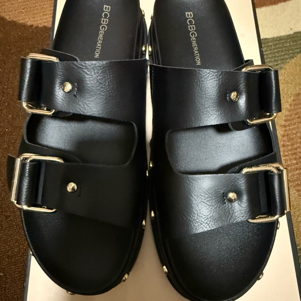 BCBGeneration Black Sandals with Gold Buckles